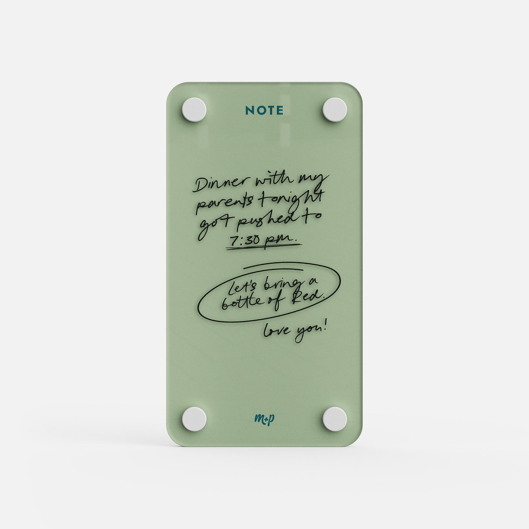 Matcha green tall magnetic acrylic note board with a handwritten message about dinner moving to 7:30